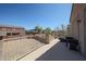 This bright balcony features wrought iron railing, and views of surrounding homes at 23104 W Kimberly Dr, Buckeye, AZ 85326