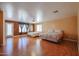 Spacious bedroom with two beds, hardwood floors, and bright windows at 23104 W Kimberly Dr, Buckeye, AZ 85326