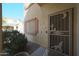 View of a screen door featuring decorative desert themes at 23104 W Kimberly Dr, Buckeye, AZ 85326