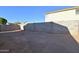 Large backyard is surrounded by a block fence, providing privacy and security at 2667 S 156Th Ave, Goodyear, AZ 85338