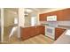 Well-equipped kitchen featuring stainless steel appliances, ample cabinet space, and modern countertops at 2667 S 156Th Ave, Goodyear, AZ 85338