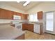 Updated kitchen with stainless steel appliances, plenty of counter space, and access to the backyard at 2667 S 156Th Ave, Goodyear, AZ 85338