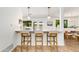 Charming kitchen with counter seating and stylish pendant lighting at 3020 E Mission Ln, Phoenix, AZ 85028