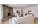 Comfortable living room features a stone fireplace and modern decor at 3020 E Mission Ln, Phoenix, AZ 85028