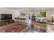 Spacious layout with dining area, modern bar seating, and an open-concept design at 3020 E Mission Ln, Phoenix, AZ 85028