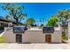 Outdoor grilling area with built-in grills, great for entertaining next to the community pool at 3020 E Mission Ln, Phoenix, AZ 85028
