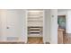 This large pantry features a countertop, drawers, and adjustable shelves for optimal organization at 3020 E Mission Ln, Phoenix, AZ 85028