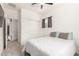 Bright bedroom featuring a ceiling fan, two windows, and neutral-toned furnishings at 3231 S Mingus Dr, Chandler, AZ 85286