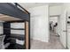Bedroom featuring a loft bed with storage underneath and access to another room at 3231 S Mingus Dr, Chandler, AZ 85286