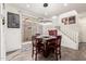 Dining area with modern lighting, stylish decor, and convenient access to outdoor space at 3231 S Mingus Dr, Chandler, AZ 85286