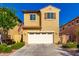 Inviting two-story home with a two car garage, manicured landscaping, and warm curb appeal at 3231 S Mingus Dr, Chandler, AZ 85286