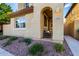 Charming front porch with cozy seating, a well-maintained exterior, and manicured landscaping at 3231 S Mingus Dr, Chandler, AZ 85286