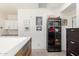 Open, well-lit landing showcasing storage and display cabinets, and views to living areas at 3231 S Mingus Dr, Chandler, AZ 85286