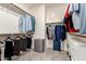 Spacious walk-in closet with ample storage and organization space for clothing and accessories at 3231 S Mingus Dr, Chandler, AZ 85286