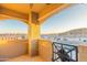 Balcony featuring sunset views of the community and string lights at 3236 E Chandler Blvd # 3031, Phoenix, AZ 85048
