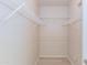 Walk-in closet featuring light gray vinyl plank flooring and white wire shelving at 3236 E Chandler Blvd # 3031, Phoenix, AZ 85048