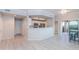 Bright, open-concept living space with an eat-in kitchen, and access to a balcony at 3236 E Chandler Blvd # 3031, Phoenix, AZ 85048