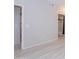 Bright living room featuring light gray vinyl plank flooring at 3236 E Chandler Blvd # 3031, Phoenix, AZ 85048