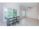 Bright, empty living space with lots of natural light and modern light-wood-look flooring at 3236 E Chandler Blvd # 3031, Phoenix, AZ 85048