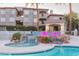 Luxury spa with waterfalls, next to large pool with nearby multi-story residential buildings at 3236 E Chandler Blvd # 3031, Phoenix, AZ 85048