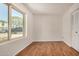 Bright bedroom featuring a large window, ample natural light, and closet space at 4121 W Paradise Dr, Phoenix, AZ 85029
