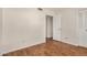 Bedroom featuring wood look flooring and closet space, perfect for comfortable living at 4121 W Paradise Dr, Phoenix, AZ 85029