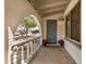 Charming front porch features a decorative archway, ample space, and welcoming decor at 4121 W Paradise Dr, Phoenix, AZ 85029