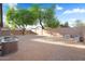 Expansive backyard featuring desert landscaping and plenty of space at 418 E Clairidge Dr, San Tan Valley, AZ 85143