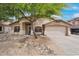 Charming single-story home with desert landscaping and a mature shade tree in the front yard at 418 E Clairidge Dr, San Tan Valley, AZ 85143