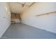 Garage featuring high ceilings, overhead storage and a washer and dryer at 4215 W Suncup Dr, San Tan Valley, AZ 85144