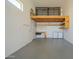Garage featuring overhead storage, work bench, and a washer and dryer at 4215 W Suncup Dr, San Tan Valley, AZ 85144