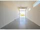 Spacious garage with grey epoxy flooring, and high ceilings at 4215 W Suncup Dr, San Tan Valley, AZ 85144