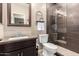 Tastefully designed bathroom features a walk-in shower with modern fixtures and stylish vanity at 44041 W Bailey Dr, Maricopa, AZ 85138