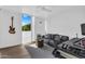 Bright bedroom with modern decor, wood floors, large window, and a comfortable workspace at 4411 N 40Th St # 59, Phoenix, AZ 85018