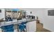 Stylish kitchen featuring a large island with seating, stainless steel appliances, and an open layout at 4411 N 40Th St # 59, Phoenix, AZ 85018