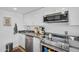 Modern kitchen with stainless steel appliances, sleek cabinetry, and a clean, contemporary design at 4411 N 40Th St # 59, Phoenix, AZ 85018