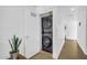 Laundry room featuring stacked washer and dryer with adjacent storage and convenient access at 4411 N 40Th St # 59, Phoenix, AZ 85018