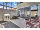 Outdoor patio area with a grill, dining table, and lounge chairs; ideal for outdoor entertainment at 4411 N 40Th St # 59, Phoenix, AZ 85018