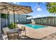 Community pool with a seating area offering a relaxing and refreshing outdoor experience at 4411 N 40Th St # 59, Phoenix, AZ 85018