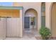 Charming home featuring an arched entryway, desert landscaping, and a welcoming front door at 4531 W Continental Dr, Glendale, AZ 85308
