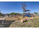 Community playground featuring slides, seesaws, and ample space for recreational activities at 4531 W Continental Dr, Glendale, AZ 85308