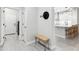 An entryway with access to the kitchen, laundry room, and hat rack at 506 E Balao Dr, Phoenix, AZ 85085