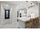 Modern kitchen features a center island with bar seating, stainless appliances, and a walk-in pantry at 506 E Balao Dr, Phoenix, AZ 85085