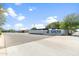Welcoming community entrance with well-maintained grounds and clear signage at 535 S Alma School Rd # 85, Mesa, AZ 85210