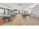 Spacious community room with tables, chairs, and bright natural light at 535 S Alma School Rd # 85, Mesa, AZ 85210