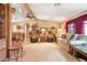 Open-concept living area featuring a ceiling fan, cozy furniture, and seamless flow to other spaces at 535 S Alma School Rd # 85, Mesa, AZ 85210