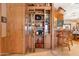 Inviting living room with built-in display cabinet and seamless flow into the dining space at 535 S Alma School Rd # 85, Mesa, AZ 85210