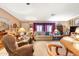 Spacious living area offering comfortable seating, ample lighting, and a welcoming atmosphere at 535 S Alma School Rd # 85, Mesa, AZ 85210