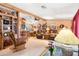 Bright living space boasting a rocking chair, comfortable seating, and a warm, inviting feel at 535 S Alma School Rd # 85, Mesa, AZ 85210