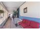 Inviting covered porch with comfortable seating and decorative plants, perfect for relaxing outdoors at 535 S Alma School Rd # 85, Mesa, AZ 85210